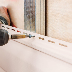 Монтаж сайдинга...